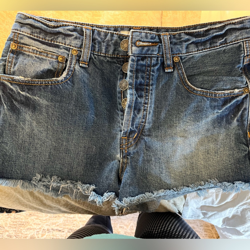 Free people button front Jean shorts with fringe